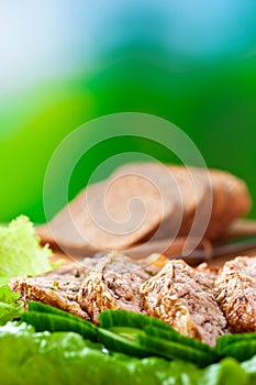 Meatloaf,cucumbers,lettuce,sliced