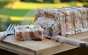 Meatloaf in terrine with pistachio