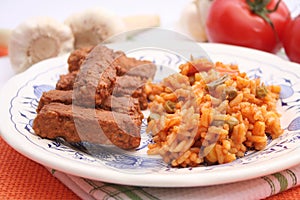 Meatsticks with rice