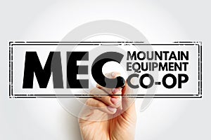 MEC - Mountain Equipment Co-Op acronym text stamp, concept background