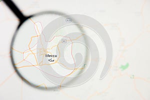 Mecca city visualization illustrative concept on display screen through magnifying glass