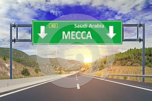Mecca road sign on highway