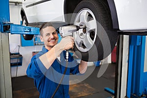 Mechanic adjusting the tire wheel