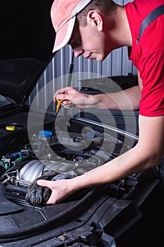 Mechanic in auto repair service