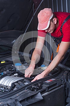 Mechanic in auto repair service