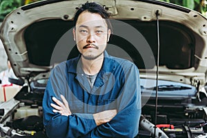 Mechanic Automobile Technician and Jobs Occupation Concept, Portrait Confident Man Technician Vehicle  Automotive Standing Arm