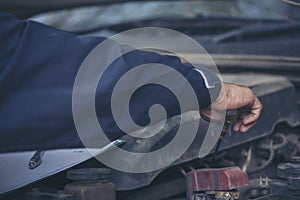 Mechanic car service auto garage in automotive mobile center. Technician workshop repair engine motor vehicles service mechanical