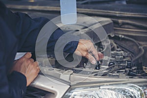 Mechanic car service auto garage in automotive mobile center. Technician workshop repair engine motor vehicles service mechanical