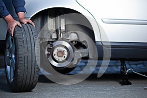 Mechanic changing a wheel