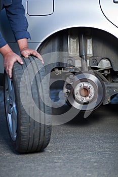 Mechanic changing a wheel