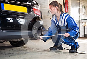 Mechanic, checking diesel exhaust emission rates