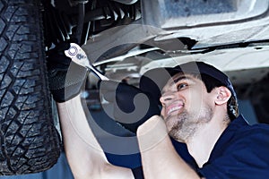 Mechanic engineer repair car at car service station