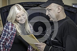 Mechanic explaining repair