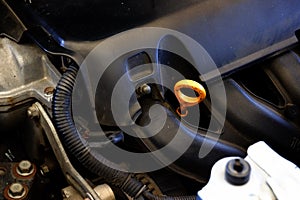 The mechanic is fixing the problem car.