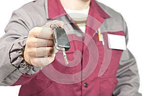 Mechanic giving a car key