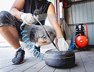 The mechanic go kart racing service change the wheels