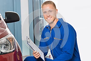 Mechanic Holding Clipboard