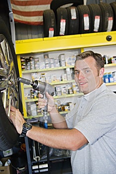 Mechanic Holding Electronic Fitter photo
