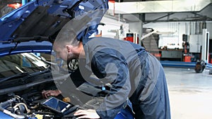 Mechanic overhauling an engine