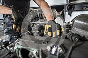 Mechanic Repair Semi Truck Diesel Engine photo