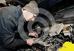 Mechanic repairman at car repair