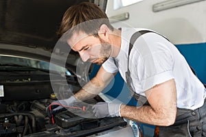 Mechanic testing electronics