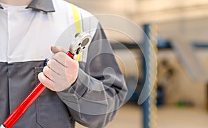 Mechanic with torque wrench.