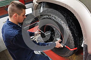 Mechanic tuning aligner for wheel alignment photo