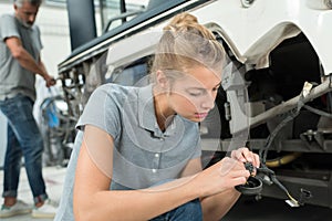 Mechanic woman in garage