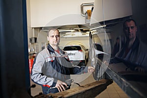 Mechanic at work in his garage