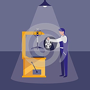 Mechanic worker with tire changer machine