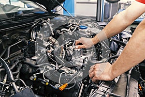 Mechanic working on engine repairs