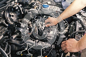 Mechanic working on engine repairs