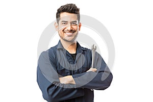 Mechanic With Wrench Standing Hands Folded On White Background