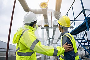 Mechanical engineer working install chilled water pipe system.