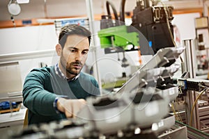 Mechanical engineer working on machines