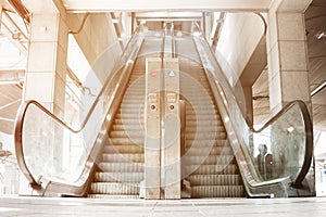 Mechanical escalator in a modern subway train station