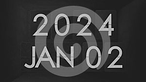 Mechanical flip clock switches from DECEMBER 2023 to JANUARY 2024. Vintage device steampunk flip calendar Happy New Year