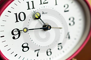 Mechanical hand clock white dial. Spring alarm clock