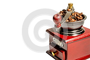 Mechanical manual retro coffee grinder. On a light background. Close-up