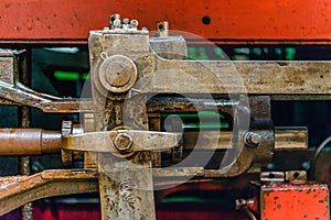 Mechanical parts of an old steam locomotive from close