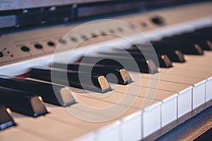 Mechanical piano keys close up with a delicate and beautiful background