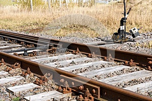 Mechanical railroad switch, turnout, at the railway tracks