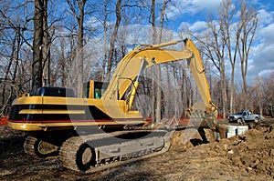 Mechanical shovel in close up unloading earth