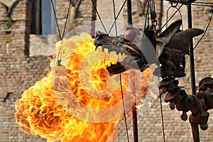 Mechanical steel steampunk-like dragon emit fire