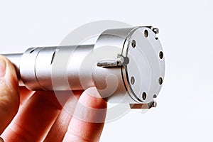 Mechanical Three-Point Internal Micrometer in hand on a white background