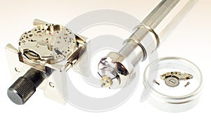 Mechanical watch movement with parts being re-assembled