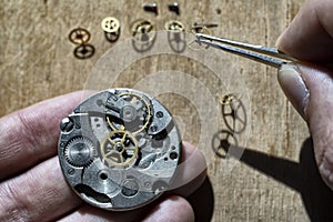 Mechanical watch repair, watchmaker`s workshop