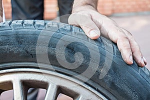 Mechanician changing unfit car tire