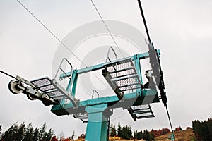 Mechanism of cableway and ski lifts at autumn mountains